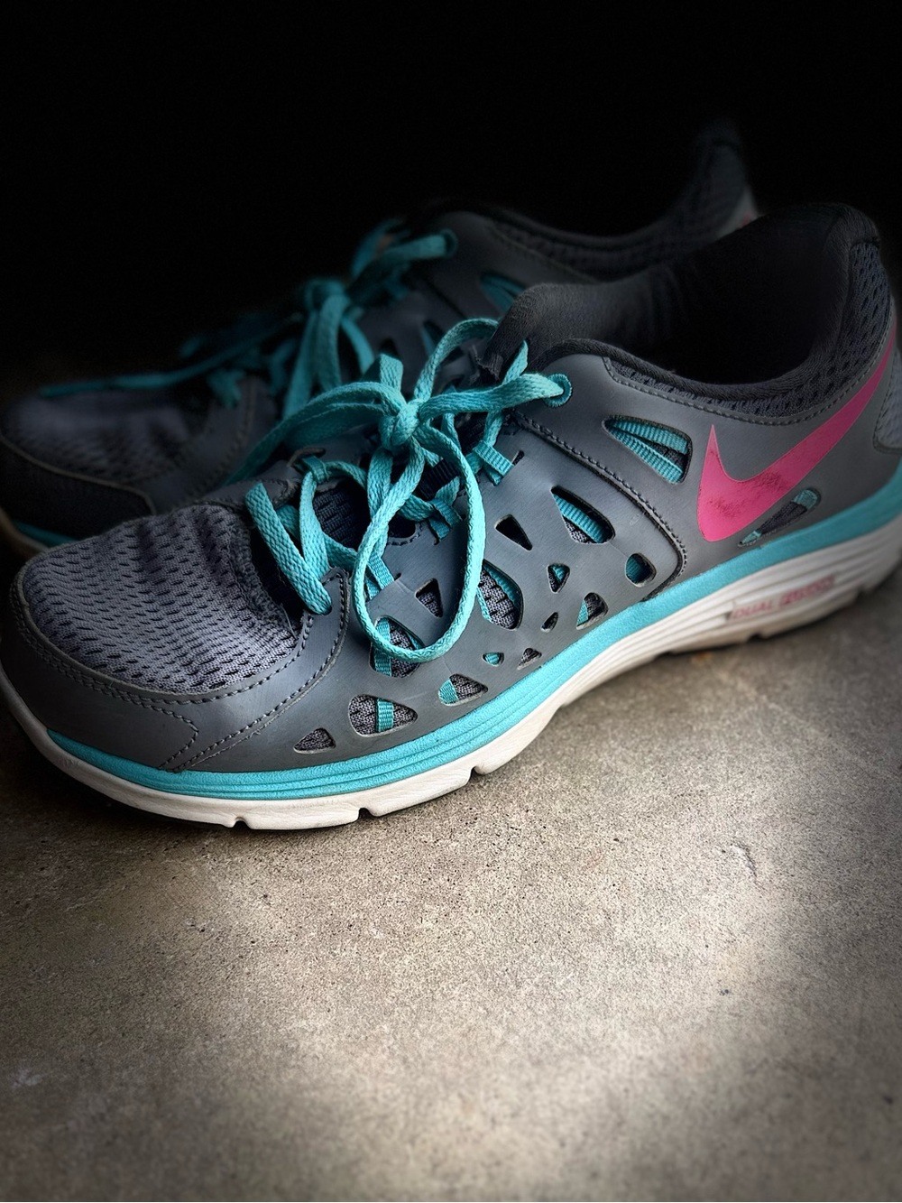 Nike Women’s Gray and Teal Athletic Shoes with Pink Swoosh